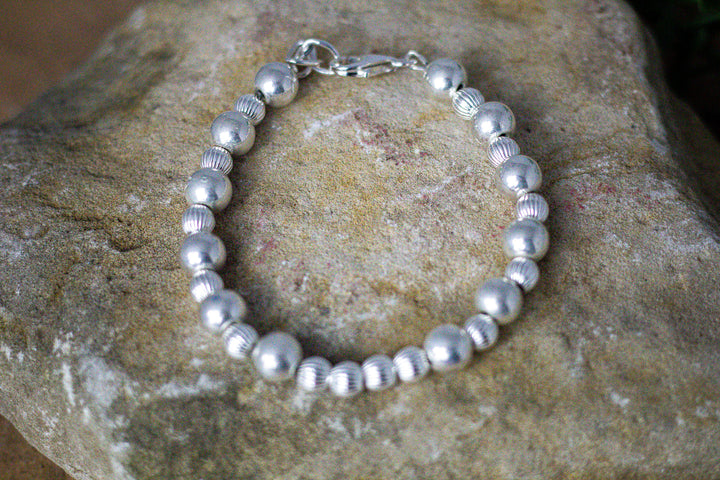 Sterling Silver Rondell and Sterling Silver Beads Bracelet 6mm/8mm 7" Long