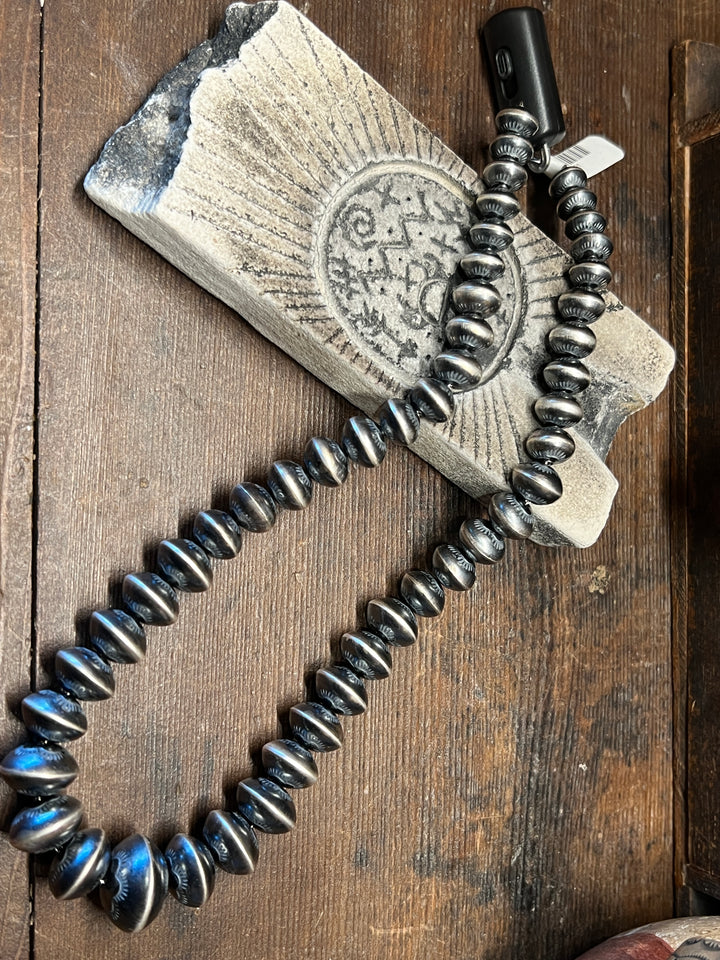 Graduated Stamped Navajo Pearls